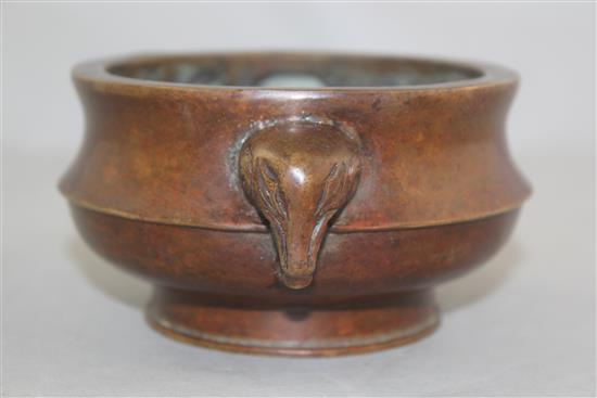 A Chinese bronze two handled censer, Gui, width 15cm